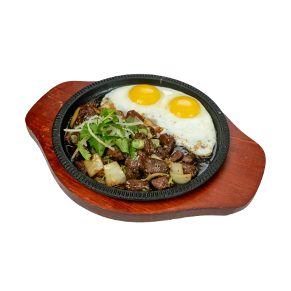 Sizzling beef steak with onions and sunny side eggs served on hot iron plate with rice or bread at 26 Viet Cafe, a Vietnamese Restaurant in Pasadena