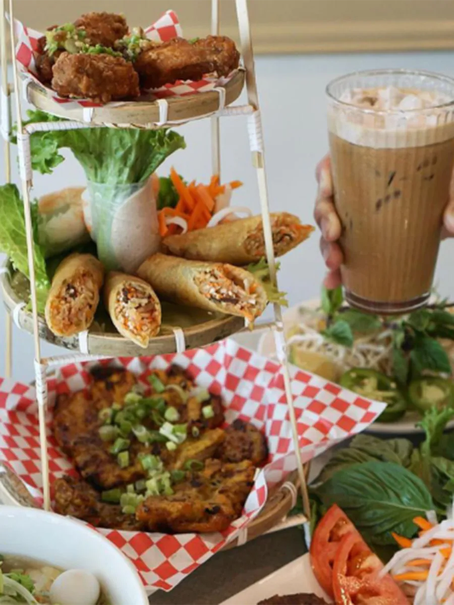 Vietnamese appetizer snack platter with chicken wings, spring roll, salad roll, chicken and pork pairing with Vietnamese ice coffee at 26 Viet Cafe, a Vietnamese Restaurant in Pasadena